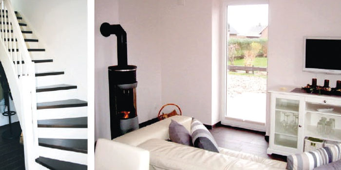 Haus-Kosel-Innenraum-Ansichten Haus-Kosel-Innenraum-Ansichten- weiße Wendeltreppe, Wohnzimmer mit Kaminofen