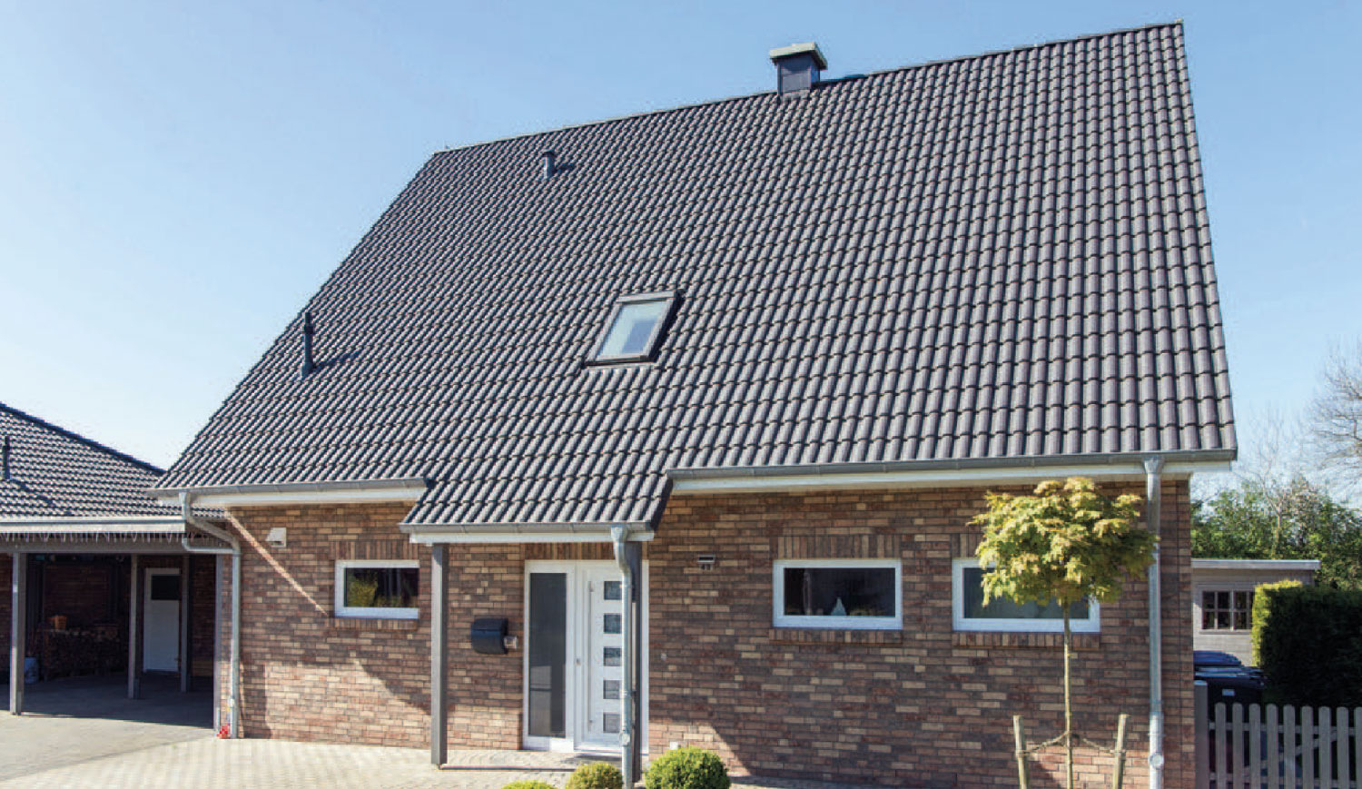 Haus-Kosel Haus Kosel-Satteldach-bunter Klinker Stein